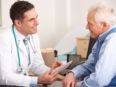 Doctor consulting with patient